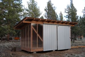 The side of the shed with polycarbonate sheets